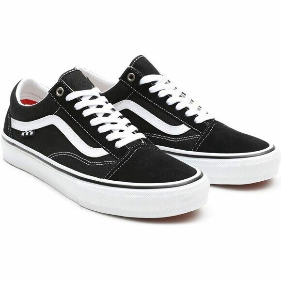 black and white low cut vans