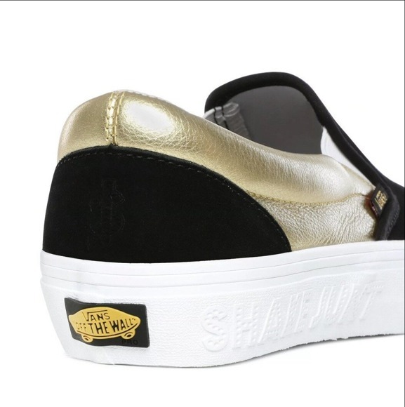 Black and gold shop slip on vans